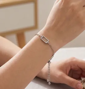 Roestvrij staal geometrische zwevende kralen verstelbare ketting armband detailweergave.