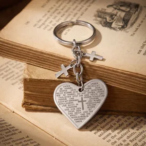 Stainless steel heart keychain with cross charms and engraved retro religious text.