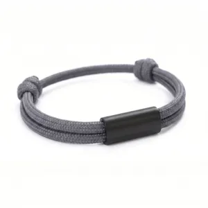 Handmade woven grey paracord bracelet with black stainless steel tube adjustable rope design