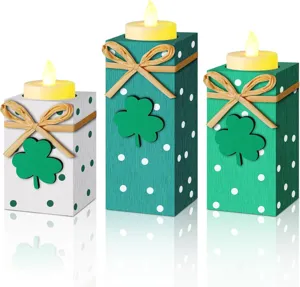 St. Patrick's Day wooden candle holder set with LED tea lights, clover decor, and rustic bows.