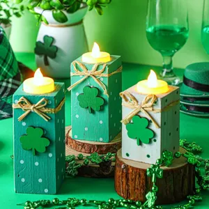 St. Patrick's Day wooden LED tealight candle holders set with shamrock decor for tabletop centerpiece.