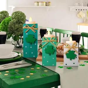 St. Patrick's Day wooden LED candle holder set with shamrock and twine bow for table decor.