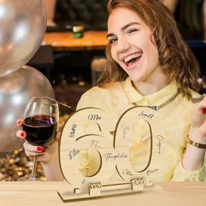 Wooden number 60 guest book sign plaque for birthday party table decor and anniversary gifts.