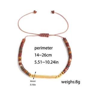Vista detallada de la pulsera trenzada de piedra natural y acero con indicaciones de tamaño.