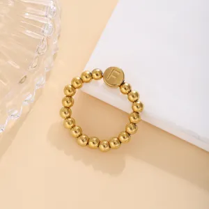 Anello elastico di perle dorate in acciaio inossidabile con ciondolo lettera F per donne