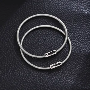 Stainless steel sun and moon couple spring bracelets detail view, matching couple jewelry.