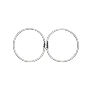 Stainless steel spring sun and moon couple bracelet detail view matching jewelry.