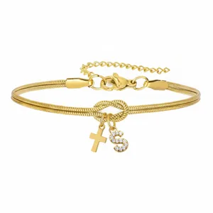 Bracciale catena serpente dorata con nodo d'amore, croce e ciondolo lettera S strass.