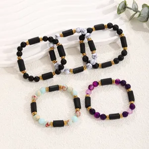 Natural stone beaded bracelet detail featuring multi-color gemstones and metal spacers.