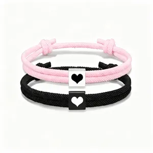 Conjunto de pulseras de cuerda trenzada con dije de corazón, joyería ajustable para parejas.