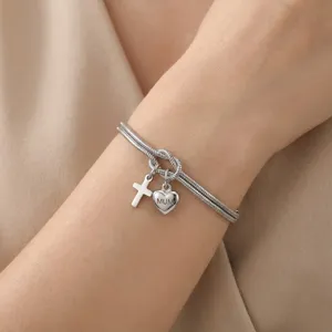Stijlvolle rvs armband met knoop kruis en hart MUM hanger perfect geschenk voor moeder.