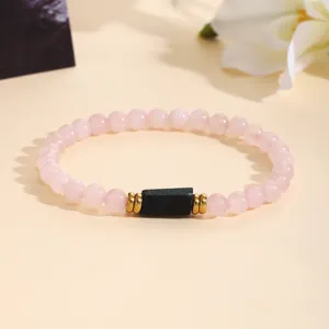 Pink crystal and tourmaline beaded bracelet for women, elegant fashion gemstone jewelry.