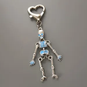 Porte-clés squelette en alliage gothique avec fermoir cœur pendentif émail bleu tendance