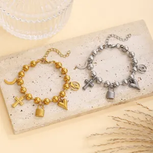 Vintage roestvrijstalen kralen bedelarmband met kruis, slot en hart hangers voor dames.
