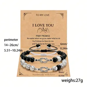 Couple natural stone beaded bracelets set with knot charm on kraft card display.