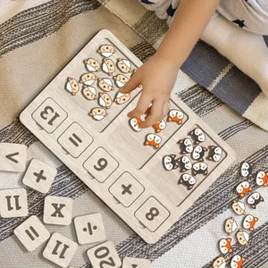 Jouet éducatif de calcul en bois pour enfants avec blocs de chiffres et animaux.