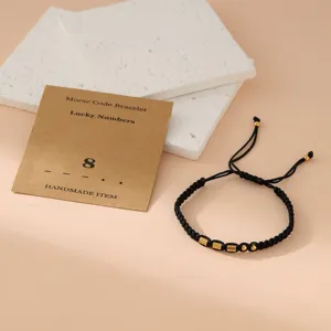 Black braided Morse code bracelet with metal beads, lucky number minimalist handmade jewelry.
