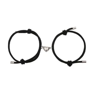 Set van twee zwarte gevlochten armbanden met magnetisch hart, verstelbare set voor stelletjes