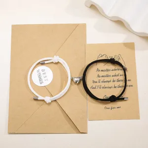 Set van koppel magnetische aantrekkingskracht hart gevlochten touw armbanden zwart wit