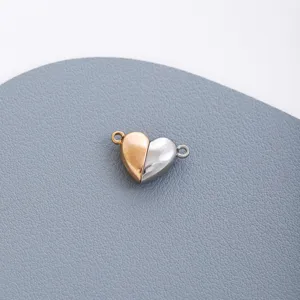 Stainless steel two-tone heart magnetic DIY jewelry connector accessory detail shot.