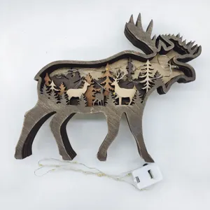 Ornement sculpté en bois d'élan avec guirlande lumineuse LED pour la décoration de Noël.