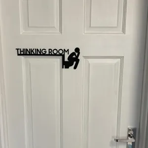 Funny metal bathroom door sign detail, black thinking man silhouette wall decor for home use.