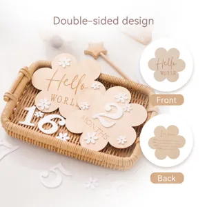 Wooden baby milestone cards detail showing double-sided cute floral design and numbers.