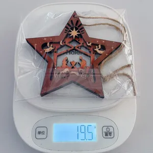 Wooden Christmas nativity star hanging ornament detail, laser cut wooden star decor for holiday.