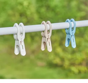 Lot de pinces à linge en plastique, pinces coupe-vent durables pour sécher vêtements et couettes.
