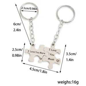 Stainless steel puzzle couple keychain detail showing exact measurements and engraved lettering.