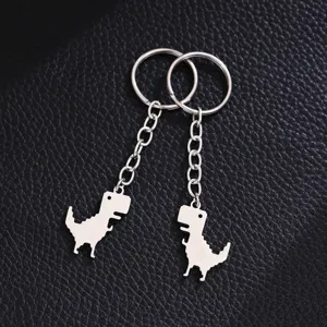 Stainless steel cute dinosaur couple keychain detail view, elegant silver metallic finish.