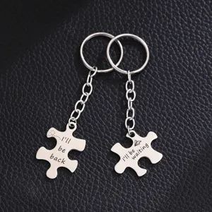Stainless steel couple puzzle keychain set, engraved romantic quotes, matching metal keyring.