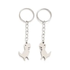 Stainless steel dinosaur keychains pair minimalist matching pendants for friends and fashion accessories.