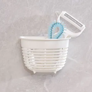 Japanese style sink suction cup hanging basket plastic mini drain basket for kitchen sponge storage.