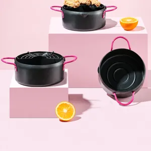 Mini non-stick tempura deep fryer pot with oil strainer basket, dual pink handles, pour spout.