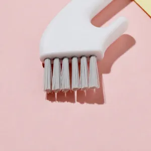 Japanese hook-handled cleaning brush for kitchen, multi-purpose crevice brush for cup lids.