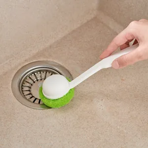 Long handle cleaning brush with green sponge head for kitchen sink and dishwashing tasks.