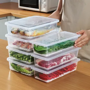 Caja de almacenamiento transparente para refrigerador con escurridor para alimentos frescos.