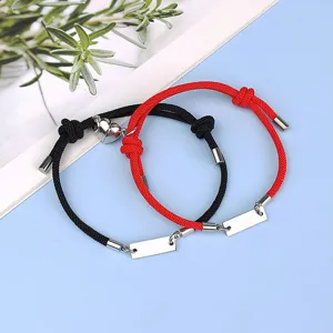 Couple braided magnetic heart bracelet set with stainless steel tag for lovers and friends.