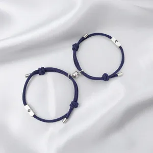 Stainless steel sun and moon magnetic couple bracelets detail, matching rope jewelry for lovers.