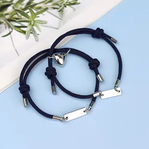 Couple magnetic heart stainless steel braided rope bracelets detail shot for lovers fashion jewelry.
