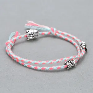Handmade braided cotton rope bracelet with alloy Buddha head charm for daily wear jewelry