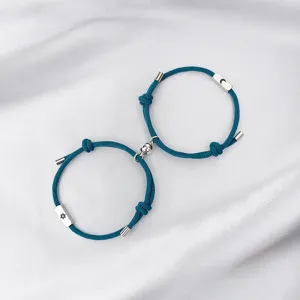 Stainless steel sun and moon magnetic couple bracelets set, blue braided rope design.