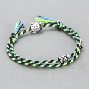 Handmade braided cotton rope bracelet with alloy Buddha head charm and beads for daily wear.