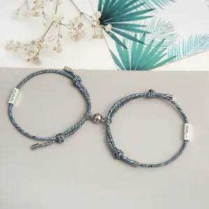 Set di bracciali intrecciati magnetici di coppia con ciondolo love, corda coordinata.