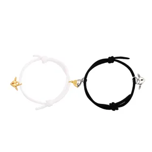 Couple magnetic attraction braided bracelet set with winged heart charms for men and women.
