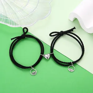Paar zwarte touw armbanden met magnetische hart en berg golf bedels voor liefhebbers geschenken