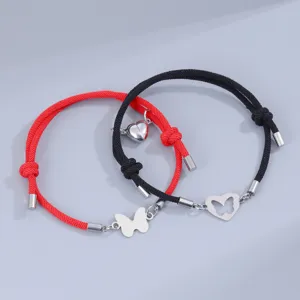 Pulsera de pareja de cuerda con mariposa magnética de acero inoxidable, diseño negro y rojo.