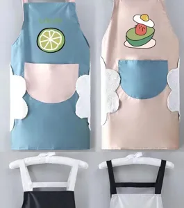 Détails en gros plan du tablier de cuisine imperméable avec essuie-mains et motifs.
