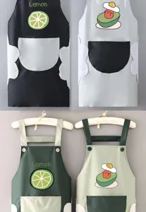 Gros plan détaillé de tablier de cuisine avec poche et essuie-main imperméable citron avocat.